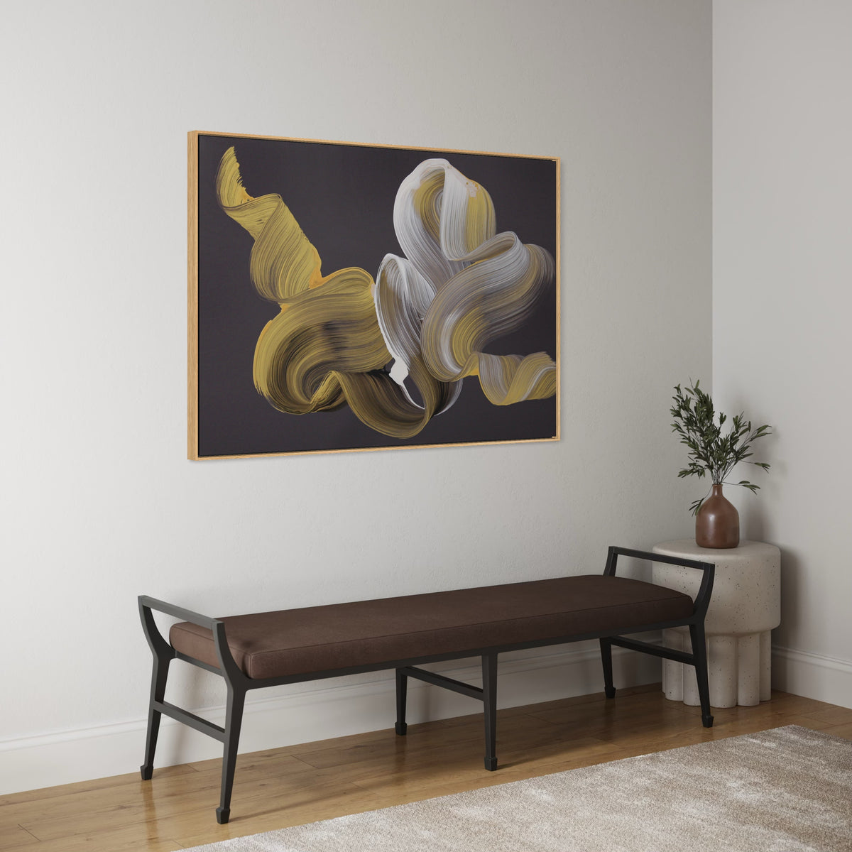 Holding a Dream by Paresh Nrshinga, gold and white abstract painting shown above a bench in a hallway