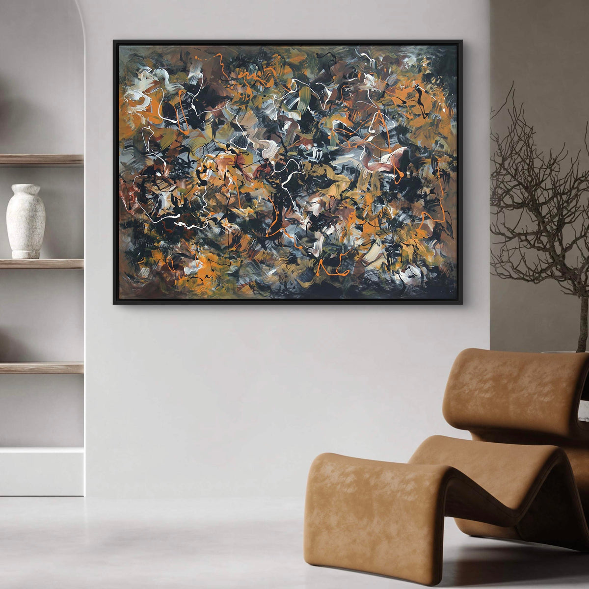 Large abstract painting titled "Dance of Love" displayed on the wall above a leather chair in a modern home decor setting. The painting features a vibrant mix of earthy colors and dynamic brushstrokes, creating an energetic and expressive artwork. The neutral-toned room and natural elements like the wood shelves complement the bold abstract style of the painting, making it the focal point of the space.