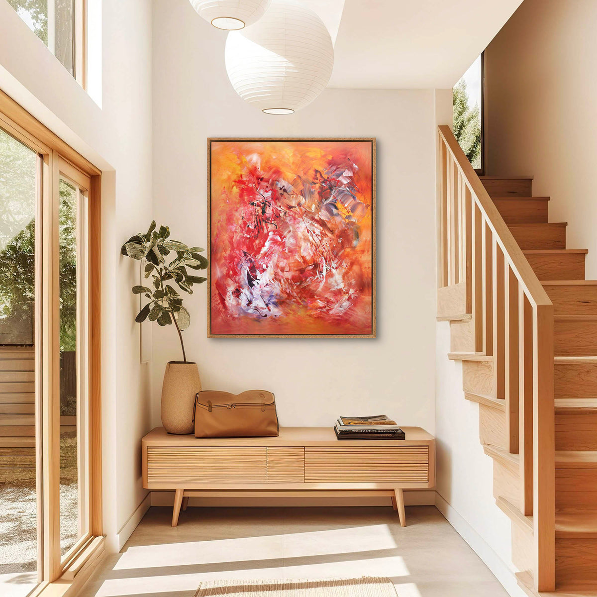 Vibrant abstract painting on canvas | Enchanted Spring by Paresh Nrshinga | Colorful modern artwork displayed in bright home entryway with wooden bench and houseplant