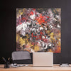 Large Abstract painting on a dark wall above a desk with office items.