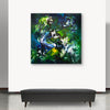 Large square abstract canvas with layered green brushstrokes and luminous depth