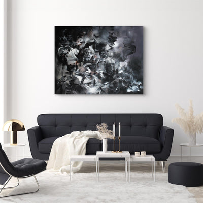Striking abstract canvas artwork | Dramatic black and white composition with swirling, ethereal brushstrokes creates a captivating visual impact in this modern living room setting.